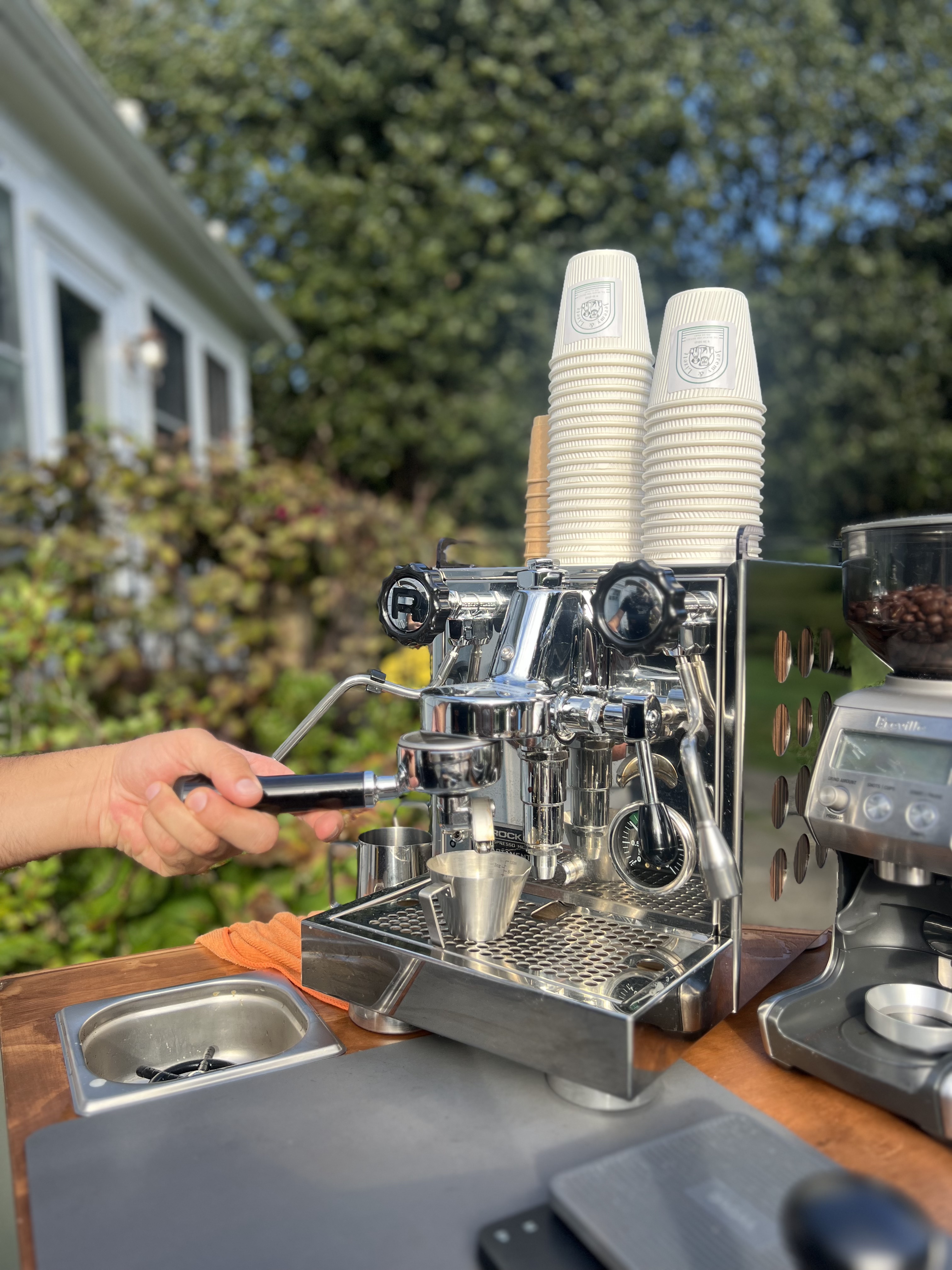 Brewed Moments Coffee Cart barista brewing traditional moka pot coffee at a New York event