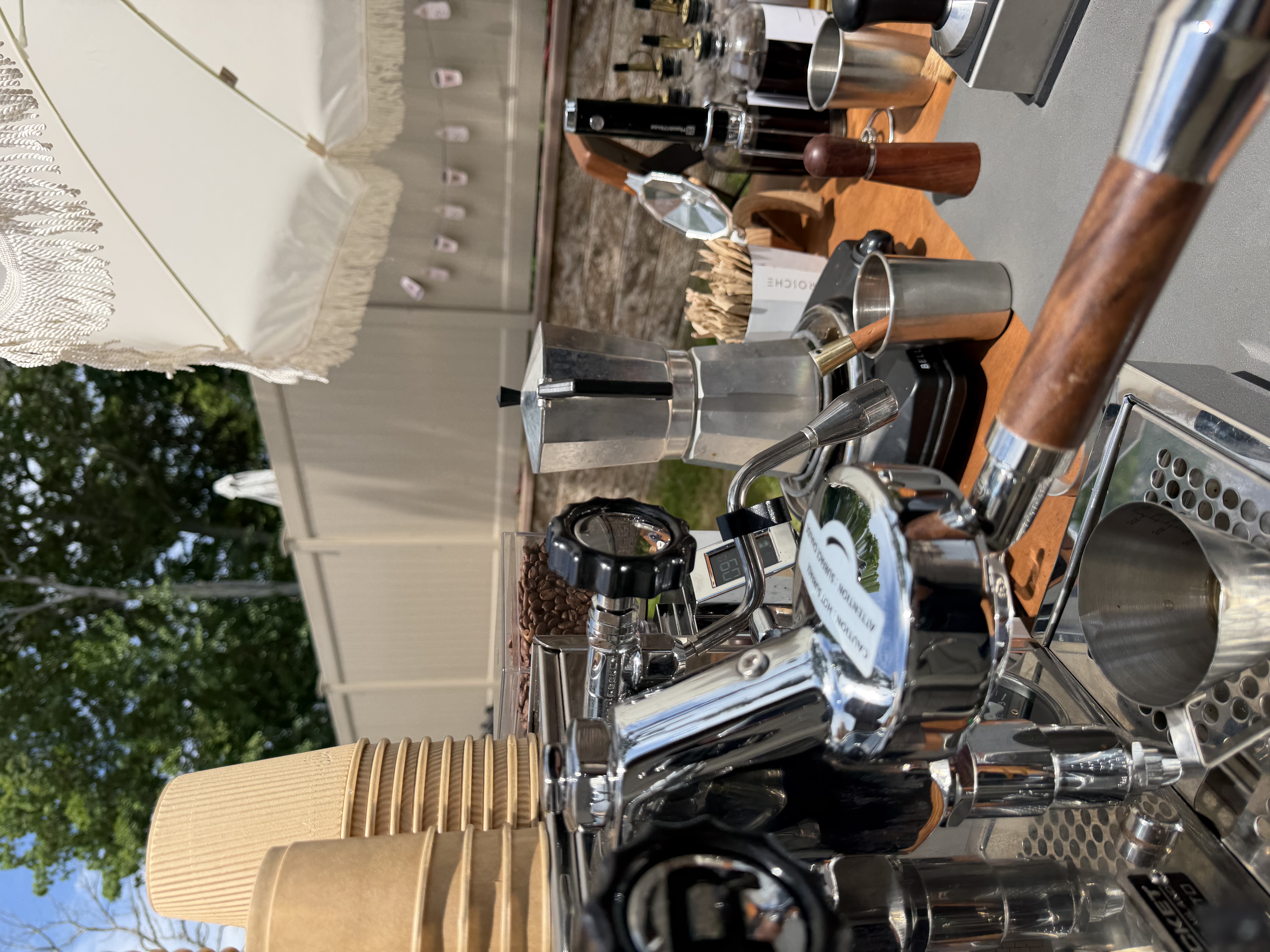 Brewed Moments Coffee Cart barista serving espresso drinks at a New York event